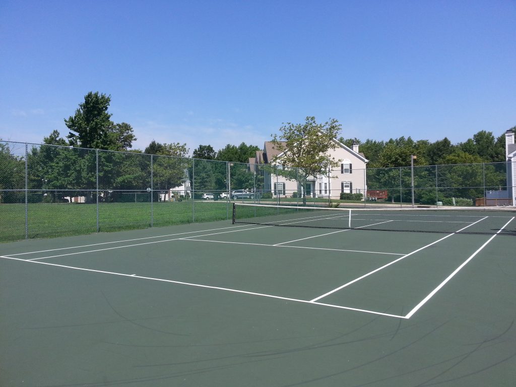 Among The Orchards amenities is this centrally located tennis court.