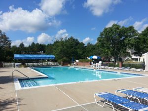 Among the amenities at Society Hill in Tinton Falls is the beautiful community pool pictured here.