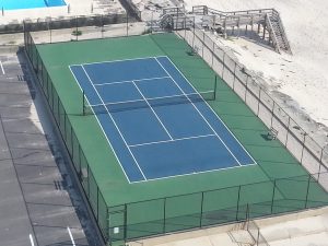 At the north end of the property next to the beach is this tennis court.